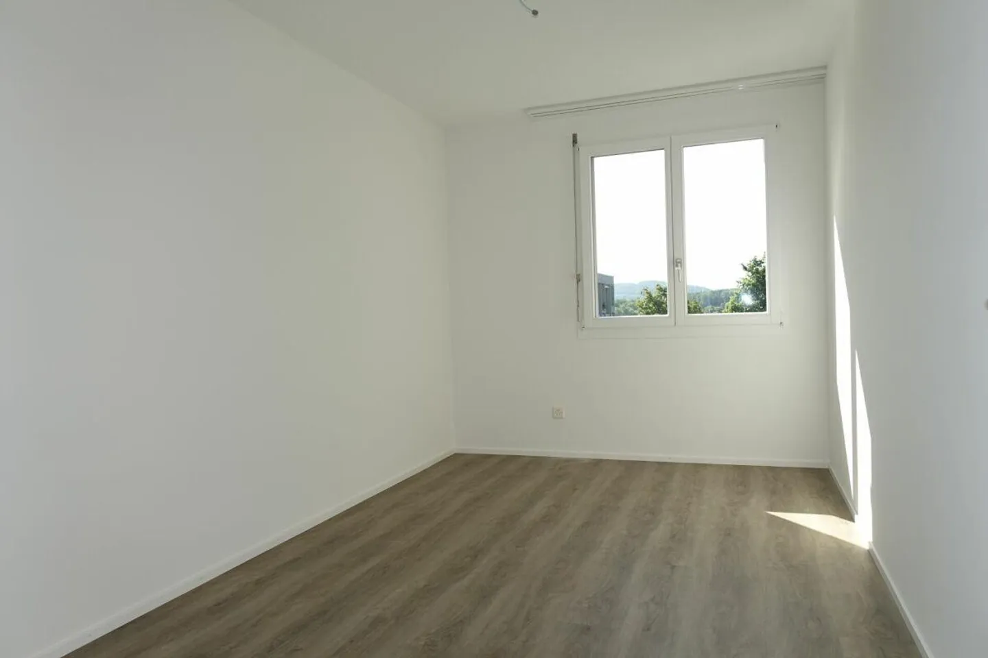 Appartement en copropriété de 3,5 pièces avec balcon et place de parking - Photo 10 sur 21
