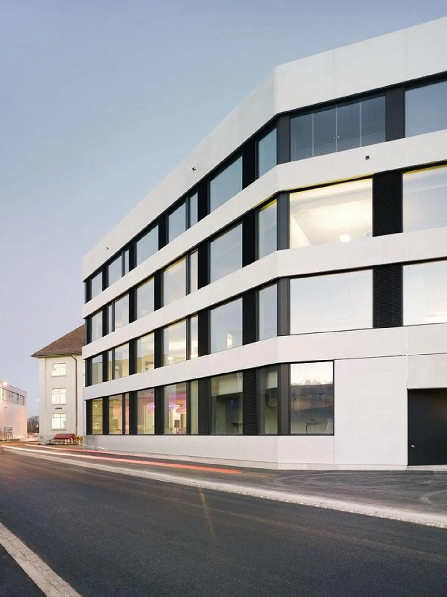 Vivre dans un style industriel, au cœur du quartier branché de Dreispitz - Photo 2 sur 11