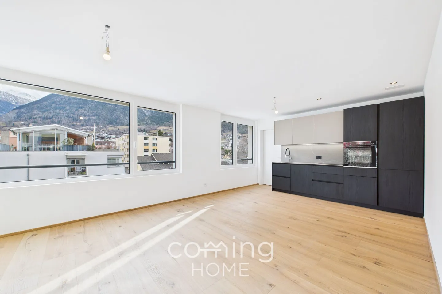 Stilvolle 2,5-Zimmer-Wohnung mit Balkon und Alpenblick in zentraler Lage in Brig-Glis - Foto 1 von 11