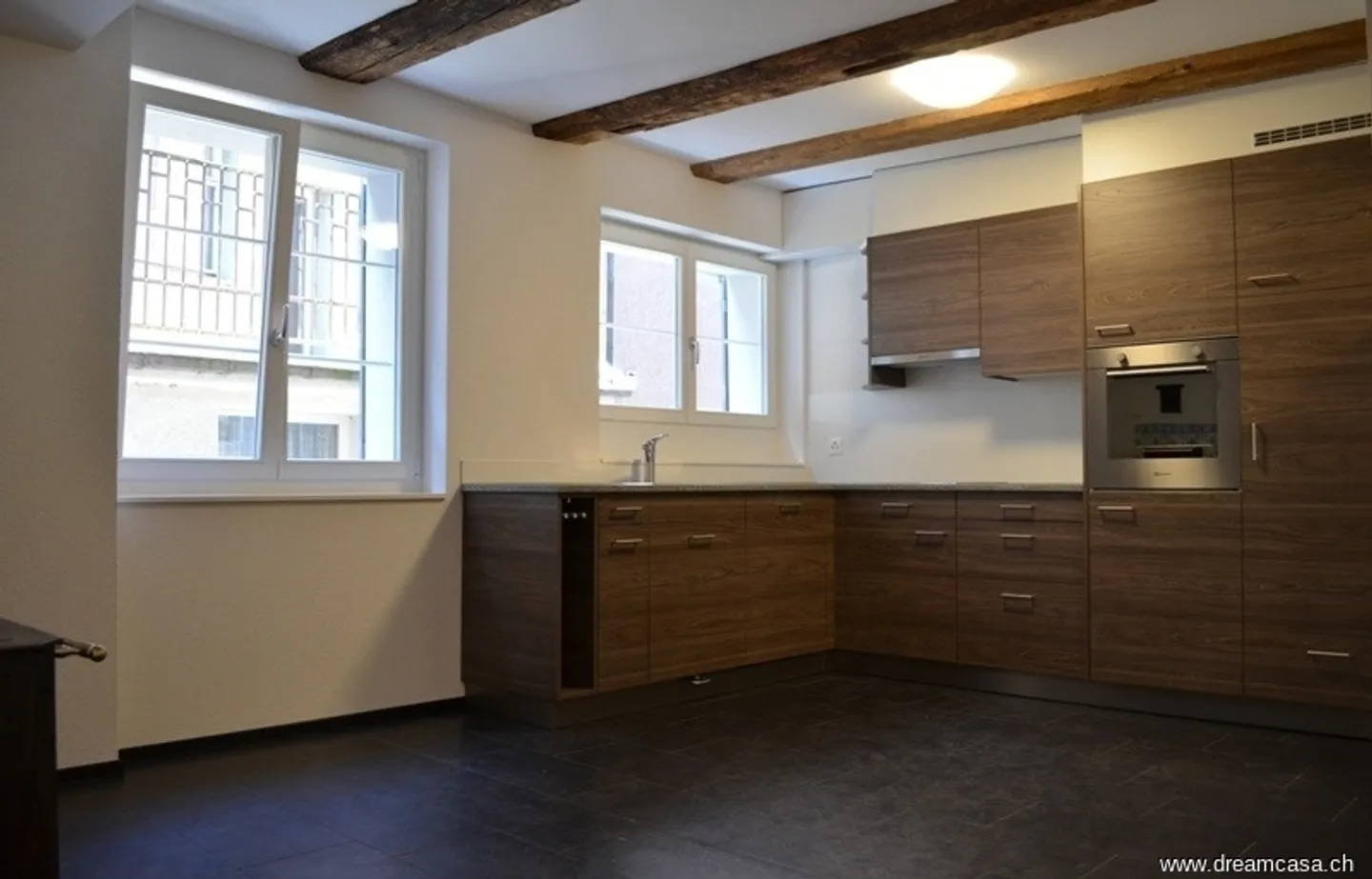 Charming Living with Cozy Tiled Stove - Photo 2 of 10