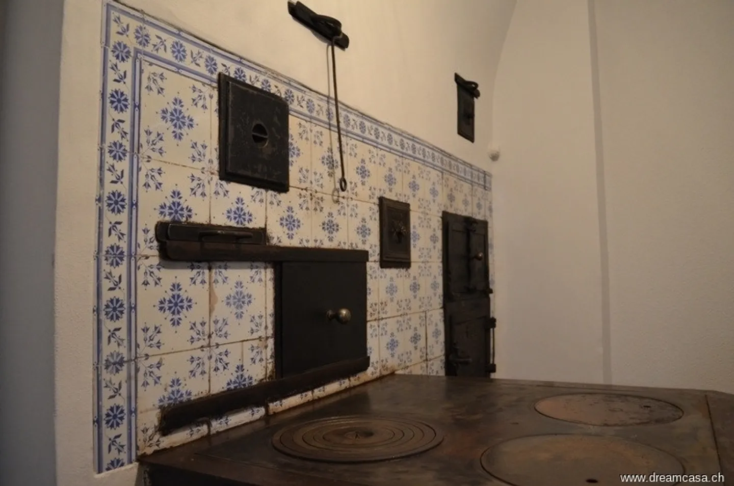 Charming Living with Cozy Tiled Stove - Photo 6 of 10