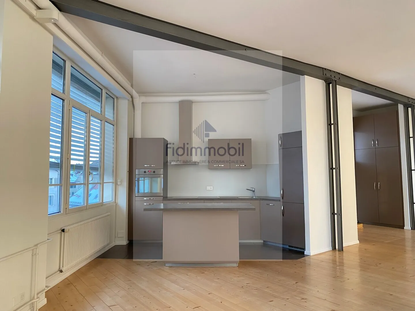 Loft luminoso e contemporaneo nel cuore di La Chaux-de-Fonds - Foto 1 di 11