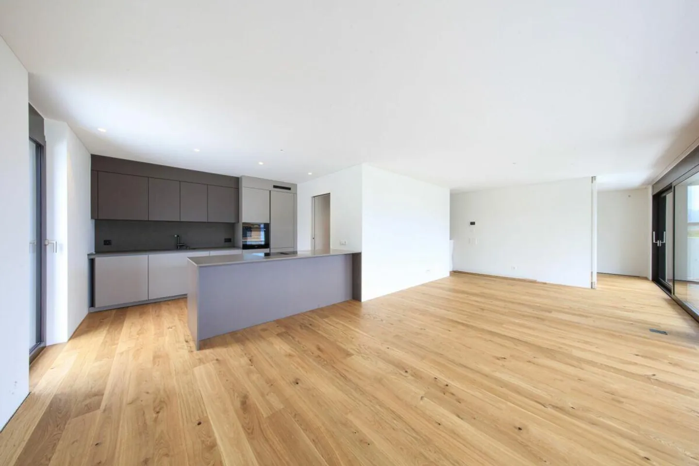 MINUSIO - Neues und elegantes 4,5-Zimmer-Apartment mit großem Garten - Foto 4 von 22