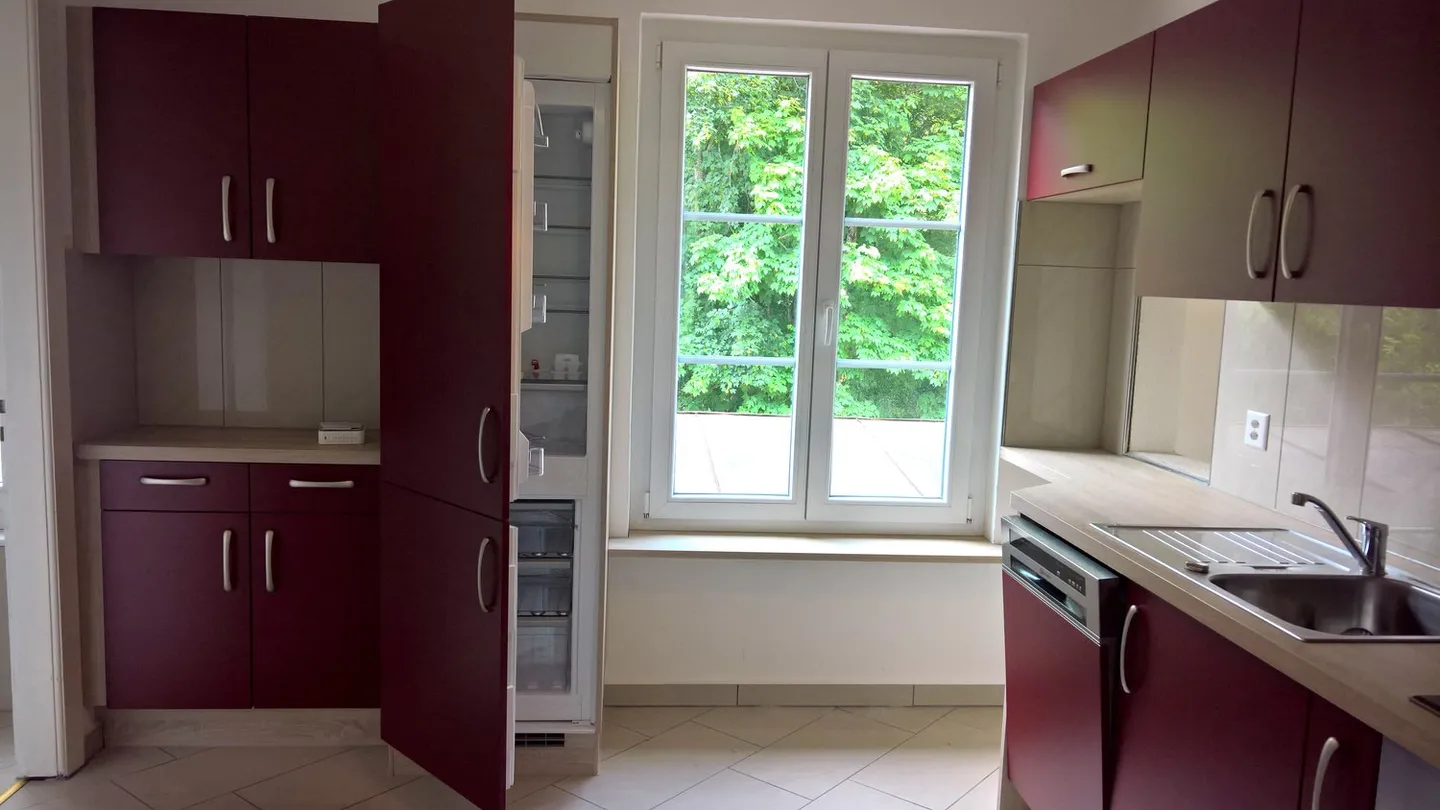 Wohnung im 1. Stock mit überdachtem Parkplatz - Foto 5 von 16