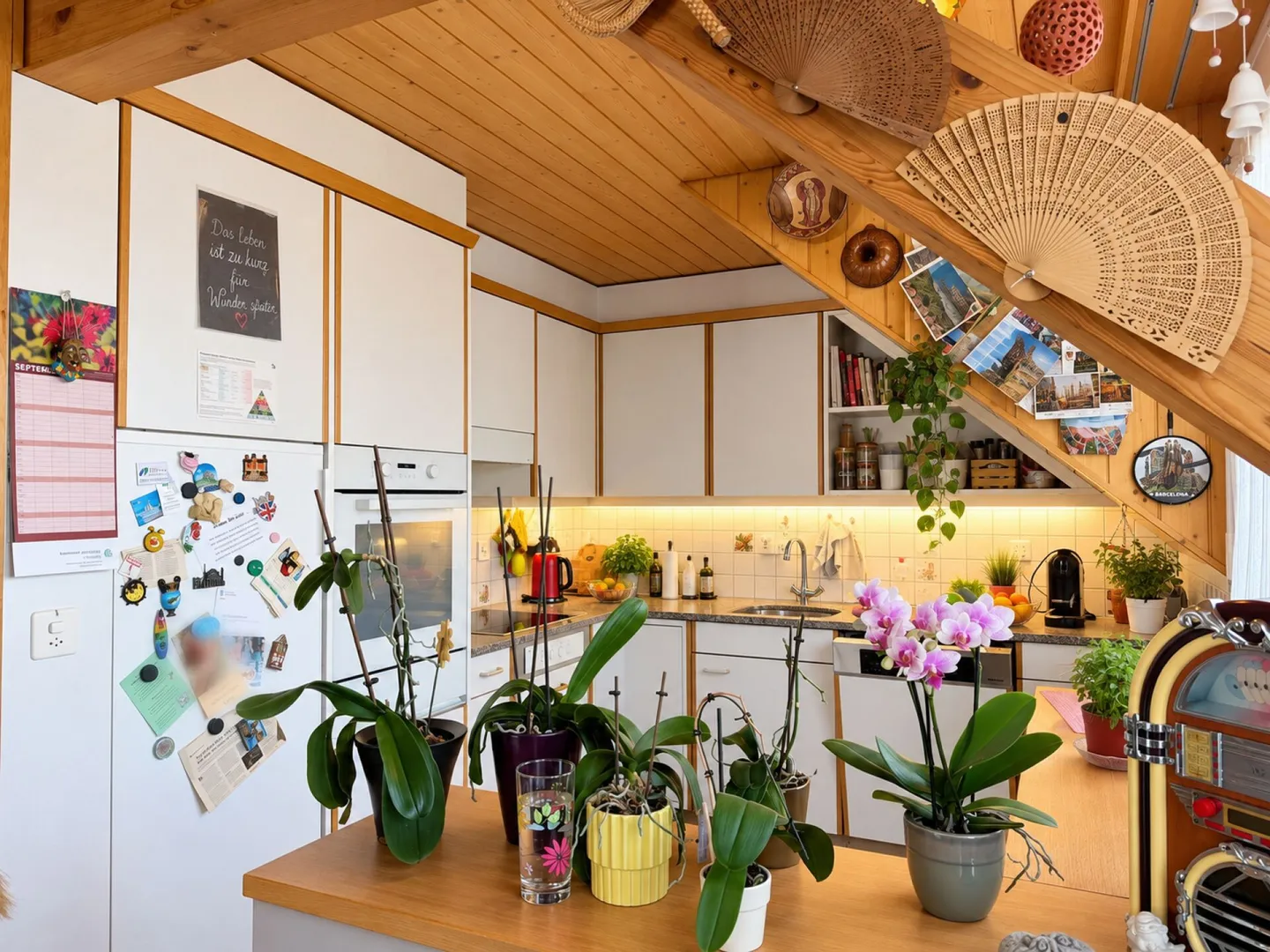 Charmante Dachwohnung mit Balkon - Foto 2 von 4