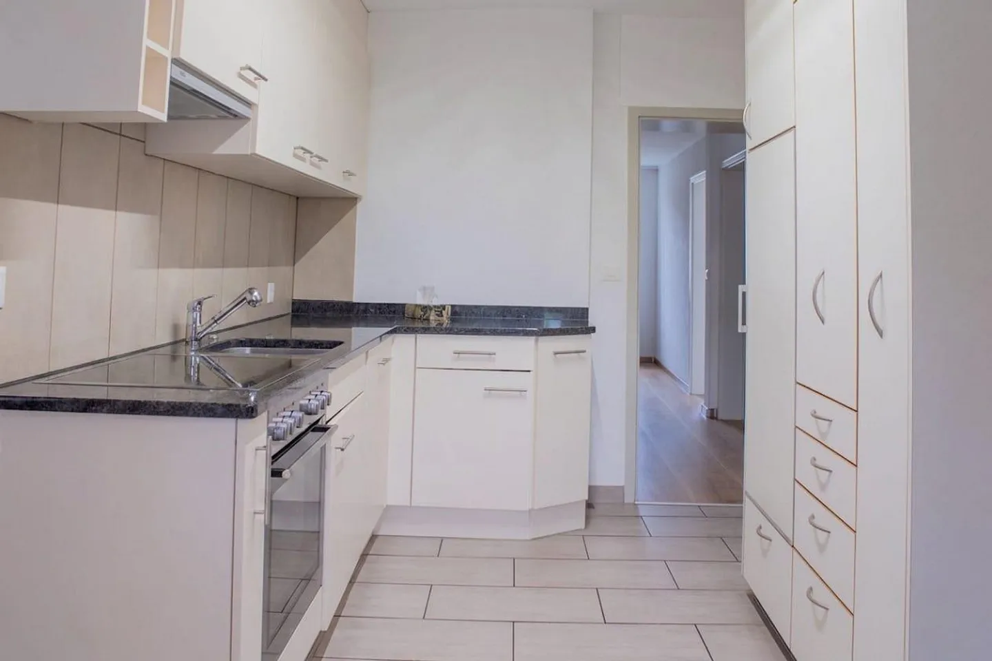 Trois appartements. Une famille. Un foyer. - Photo 7 sur 10