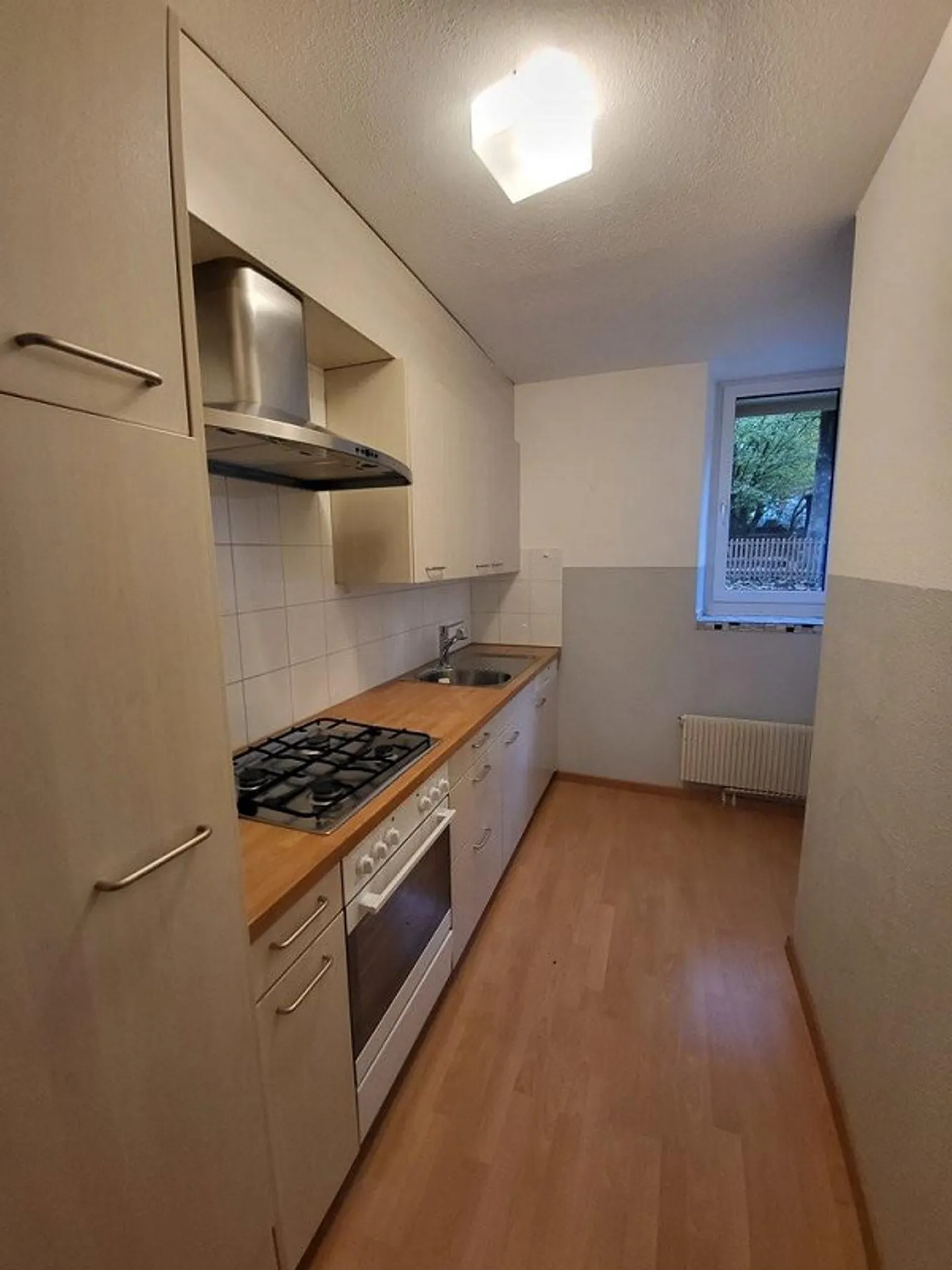 Vivre confortablement dans un immeuble multifamilial bien entretenu avec un espace de jardin - Photo 2 sur 6