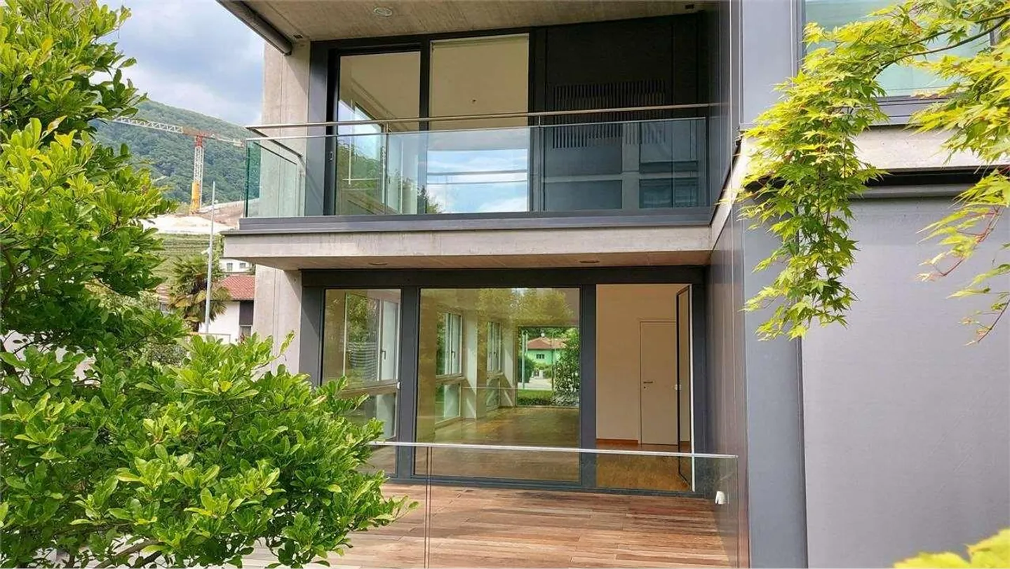 Prestigewohnung mit 4,5 Zimmern, Terrasse und Garten in Bioggio - Foto 1 von 5