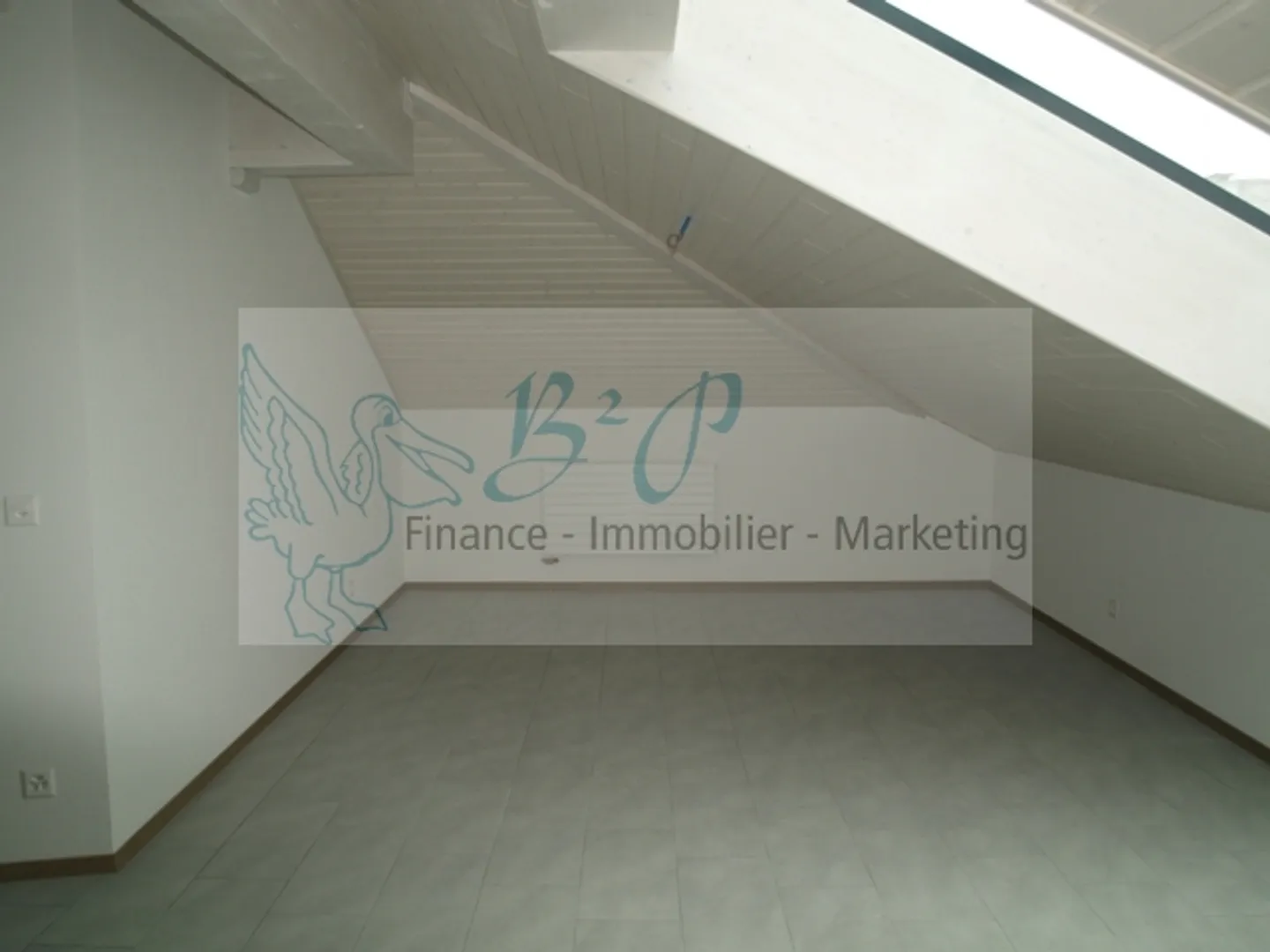 Charmante Dachwohnung - Foto 6 von 11