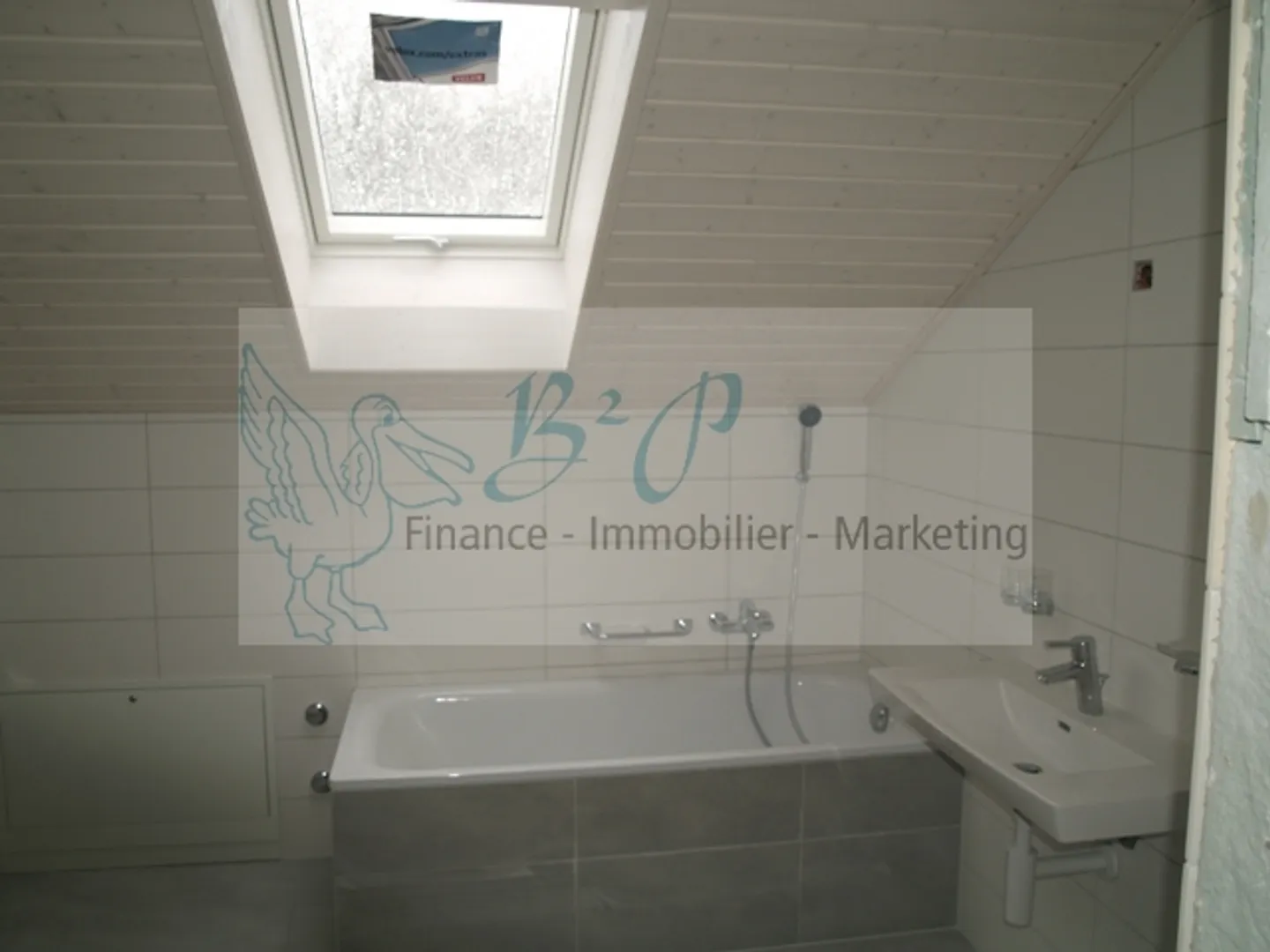 Charmante Dachwohnung - Foto 8 von 11