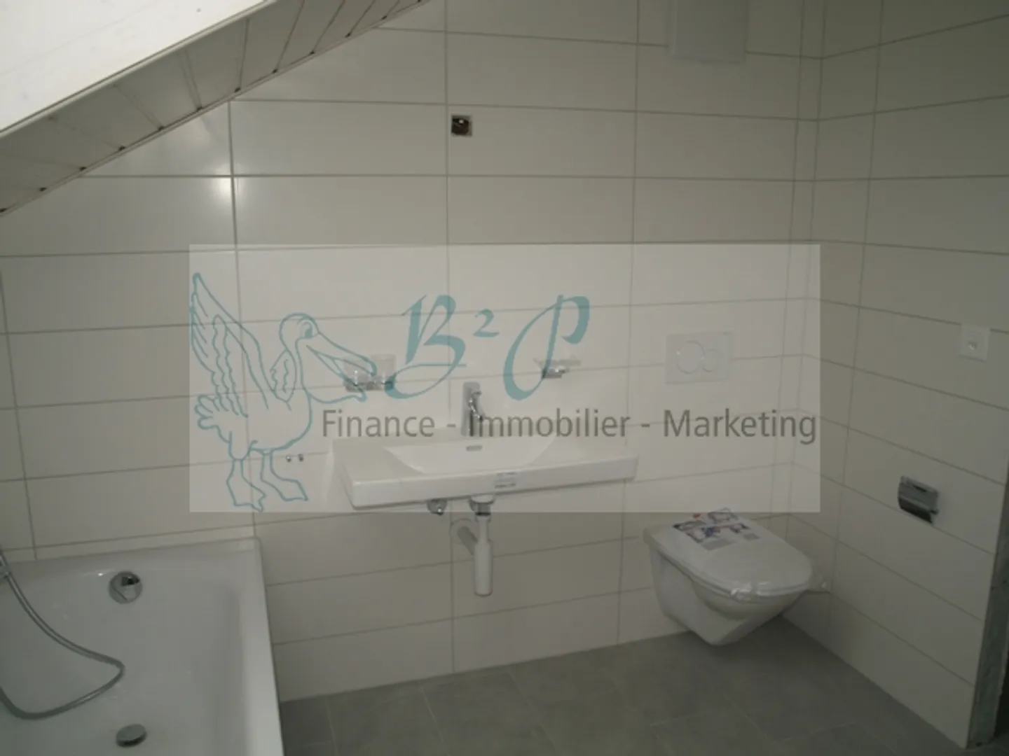 Charmante Dachwohnung - Foto 10 von 11