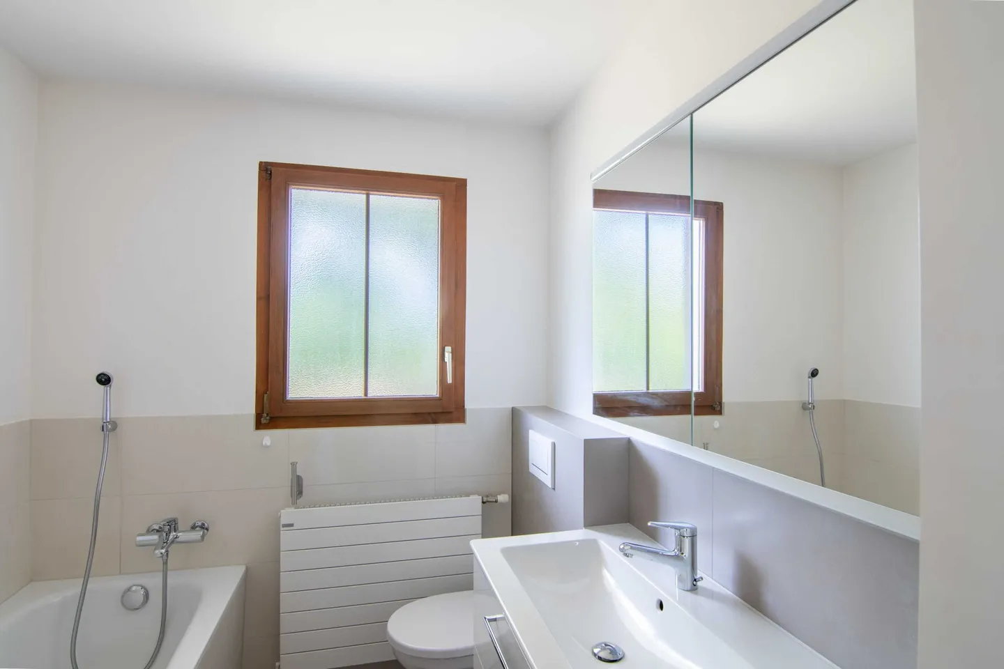 Maison bifamiliale indépendante avec espace polyvalent et atelier - Photo 8 sur 15