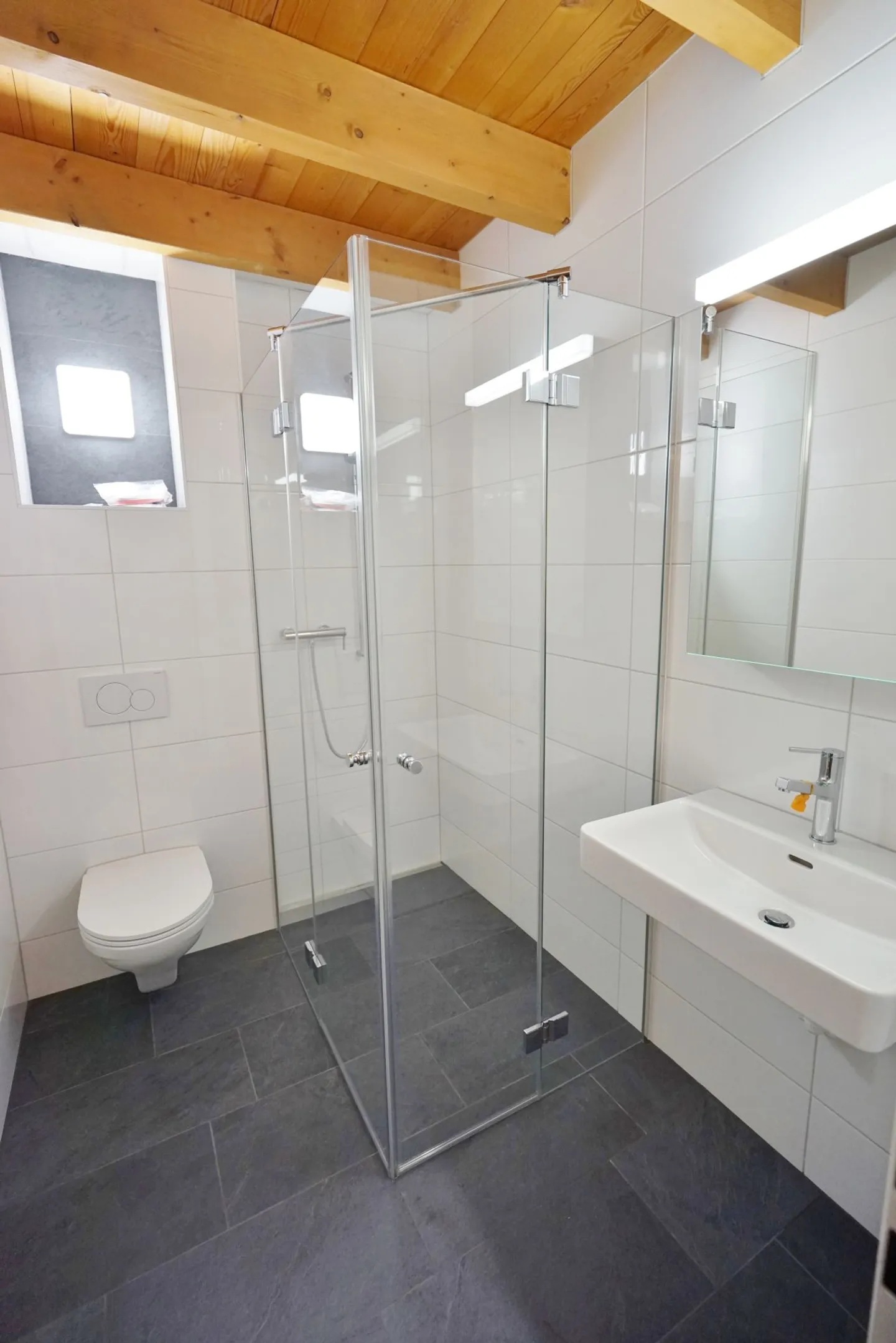 Charmante Dachgeschosswohnung mit Garten - Foto 5 von 8