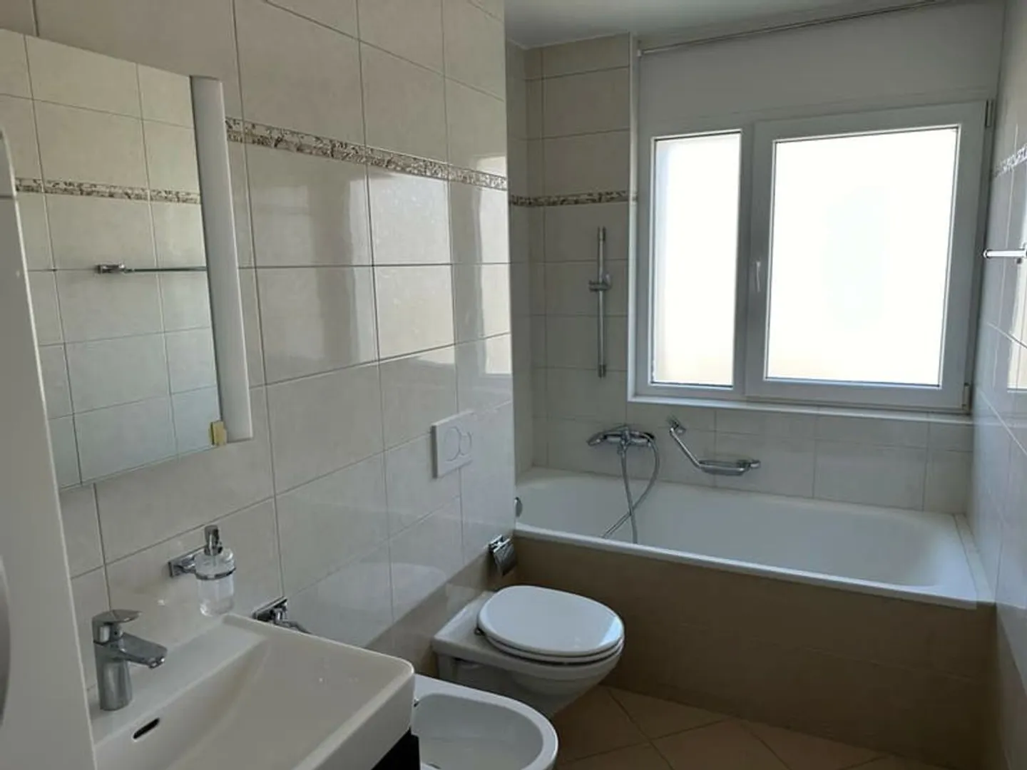 Appartement à louer - Photo 3 sur 12