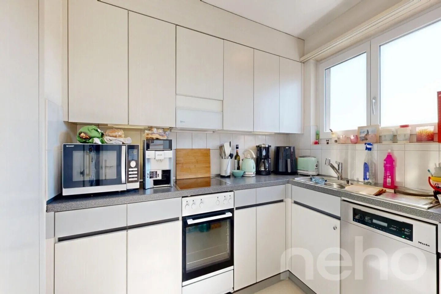 Maison multifamiliale bien entretenue avec 9 appartements à Schwarzenbach SG - Photo 10 sur 12