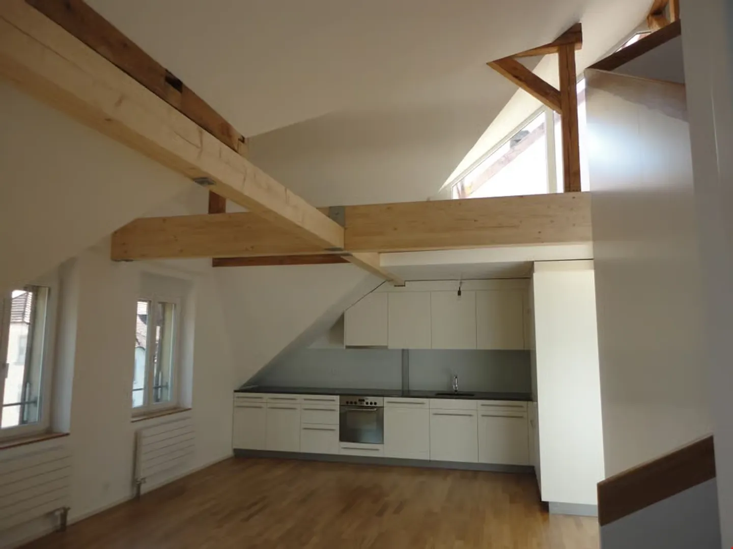Moderno attico 3.5 locali con galleria e terrazza - Foto 1 di 13