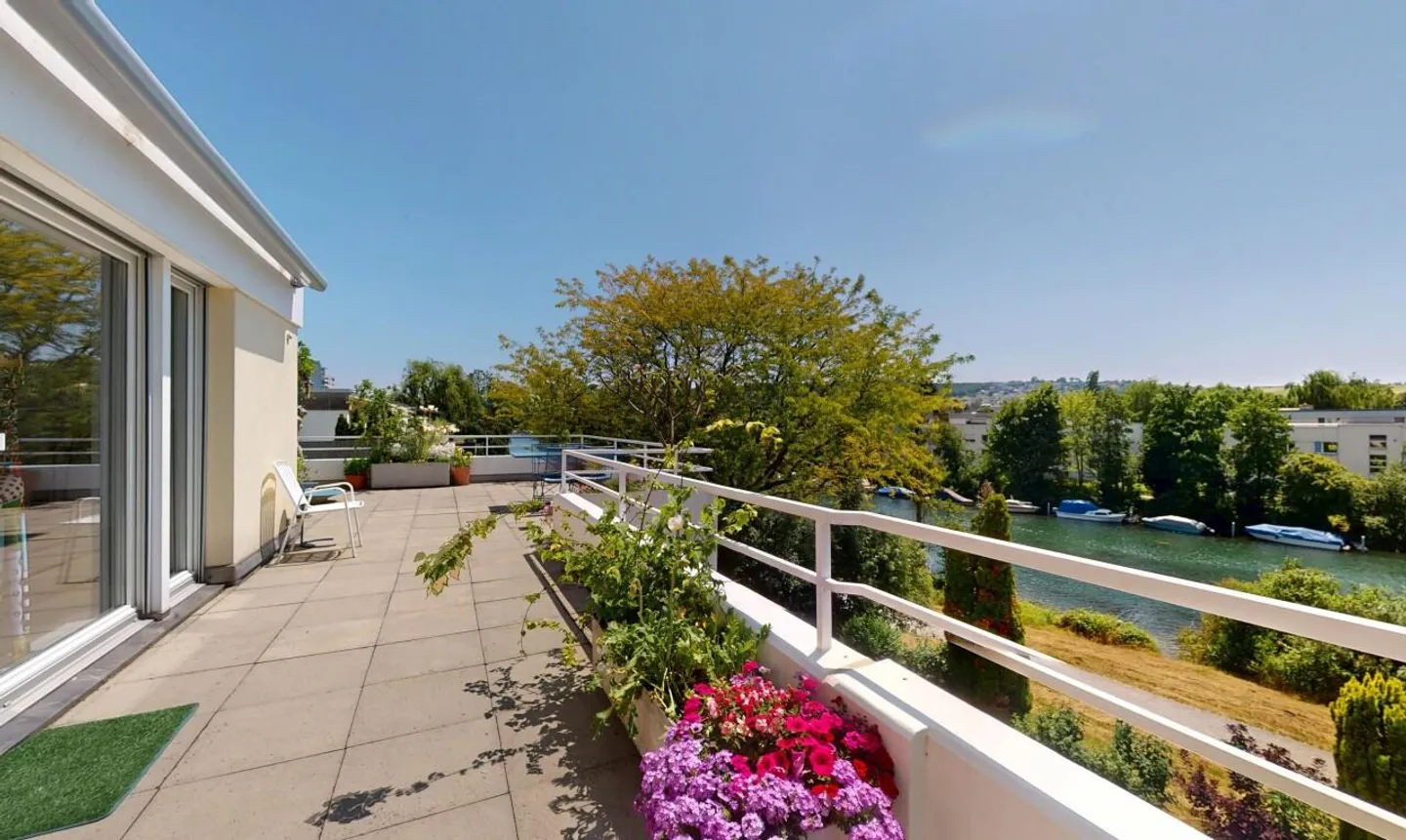 Modern and bright penthouse apartment directly on the Zihl - Photo 1 of 11