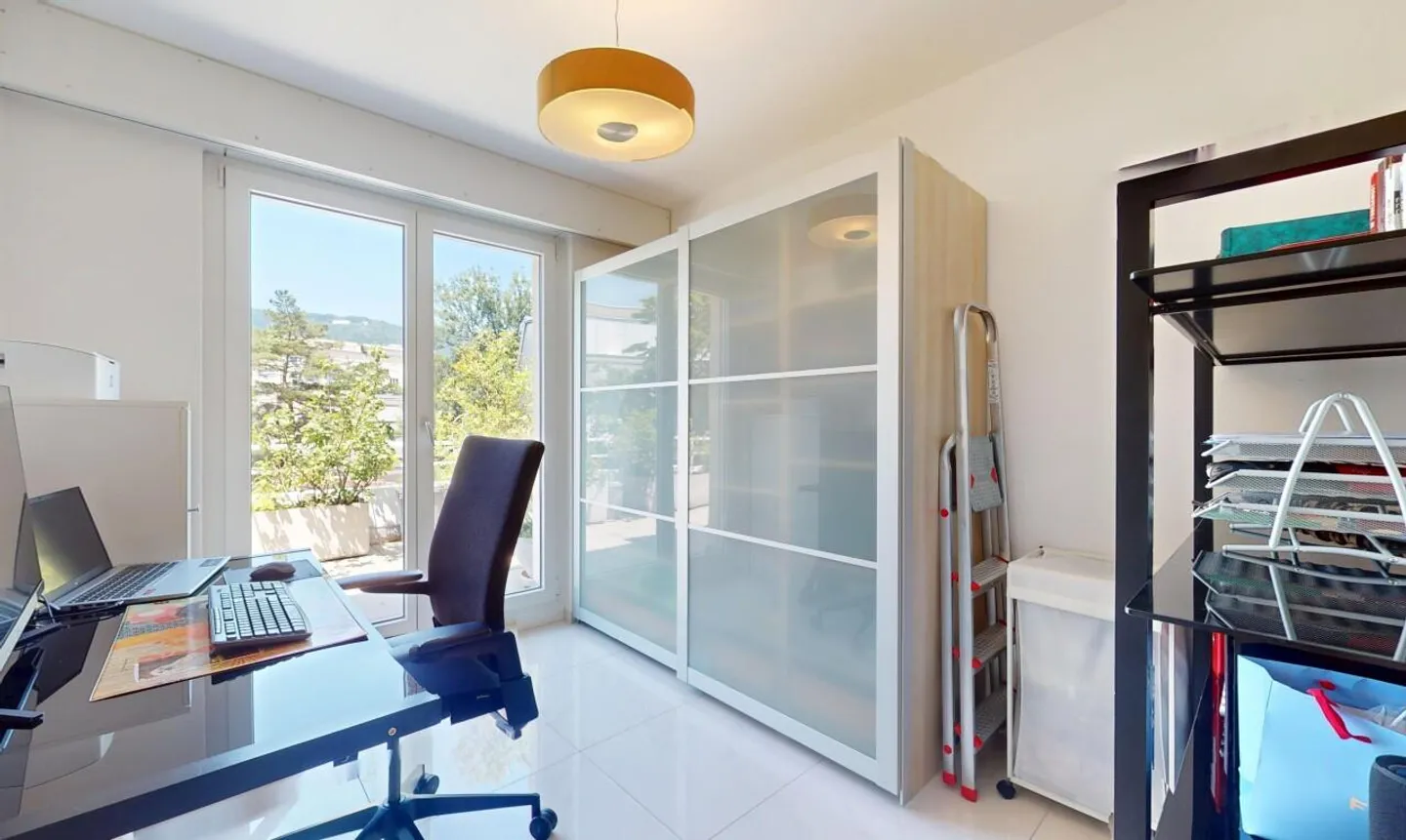 Modern and bright penthouse apartment directly on the Zihl - Photo 9 of 11