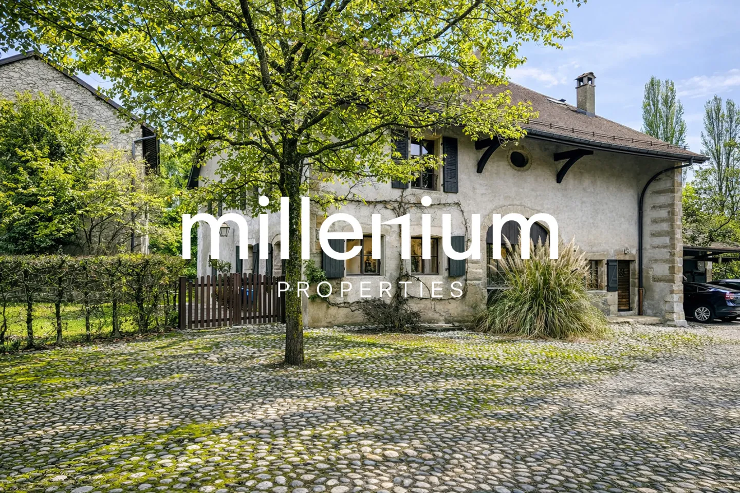 Charmante maison avec jardin bordé d'arbres à Collex - Photo 1 sur 19