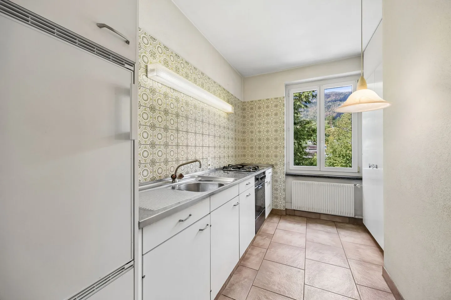 Vielseitiges Dreifamilienhaus mit viel Umschwung und grossem Potenzial - Photo 6 of 15