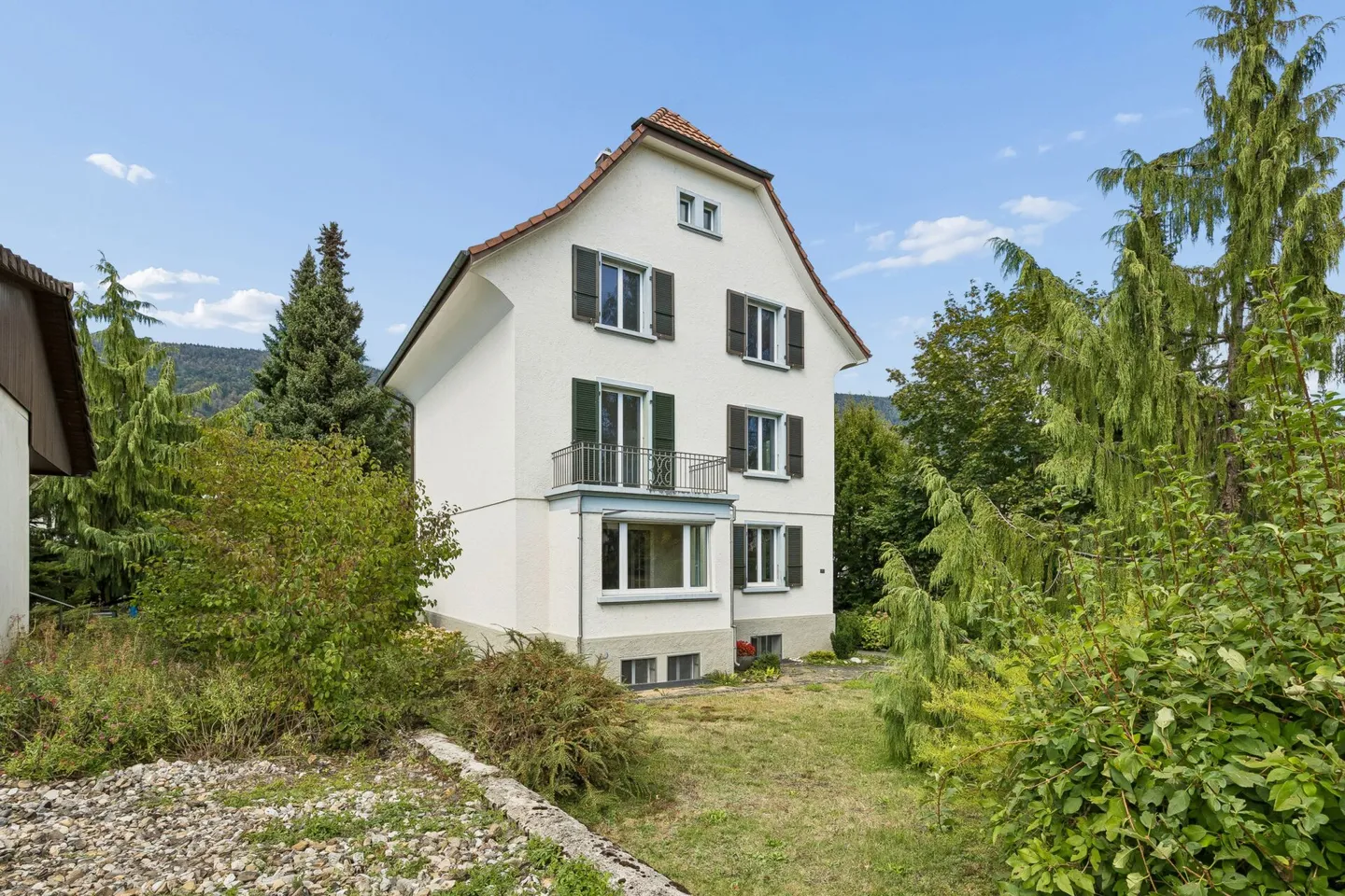 Vielseitiges Dreifamilienhaus mit viel Umschwung und grossem Potenzial - Photo 13 of 15