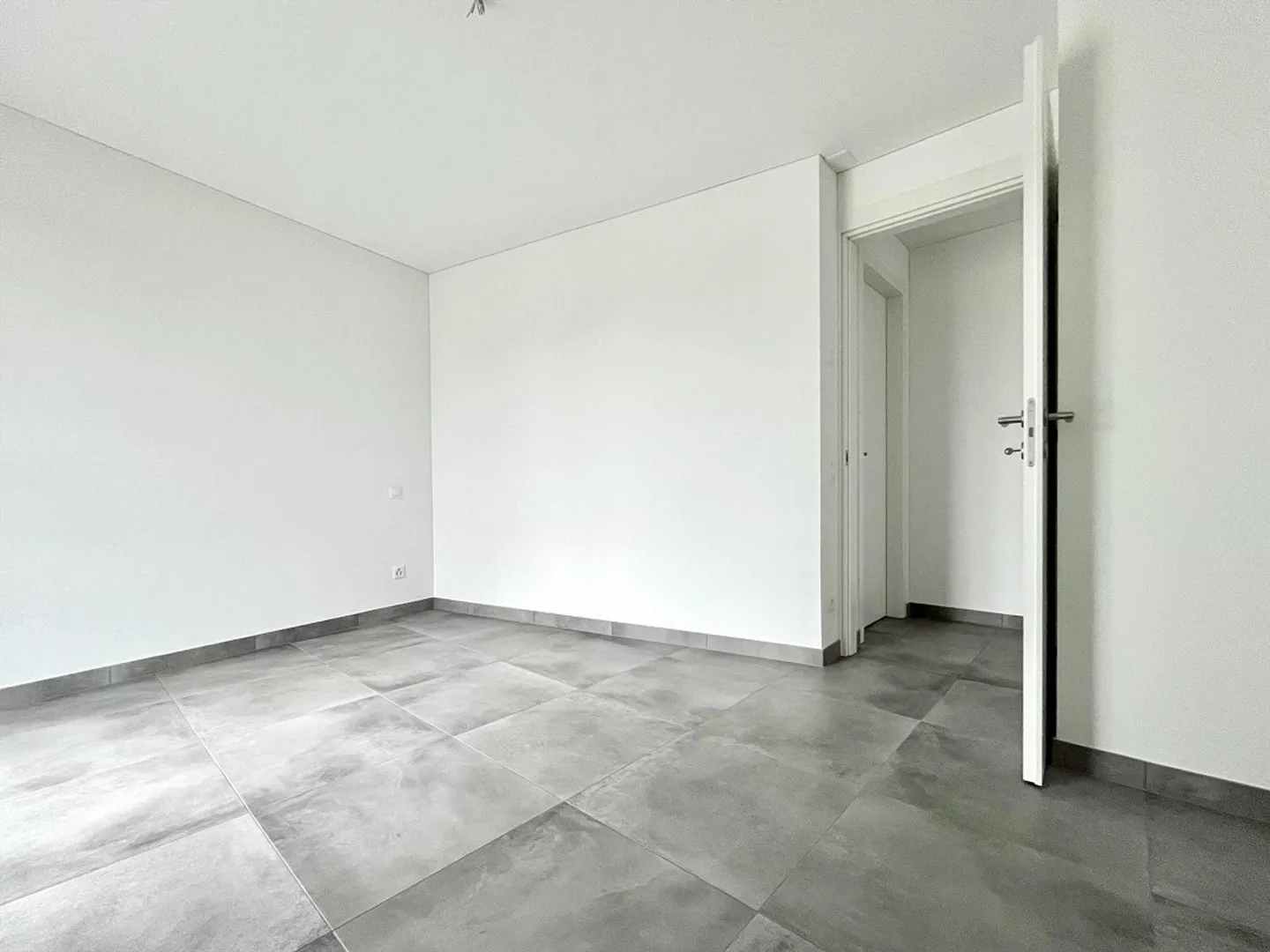 In affitto: Nuovo appartamento di 2,5 locali con terrazza a Lugano Tesserete - Foto 7 di 9