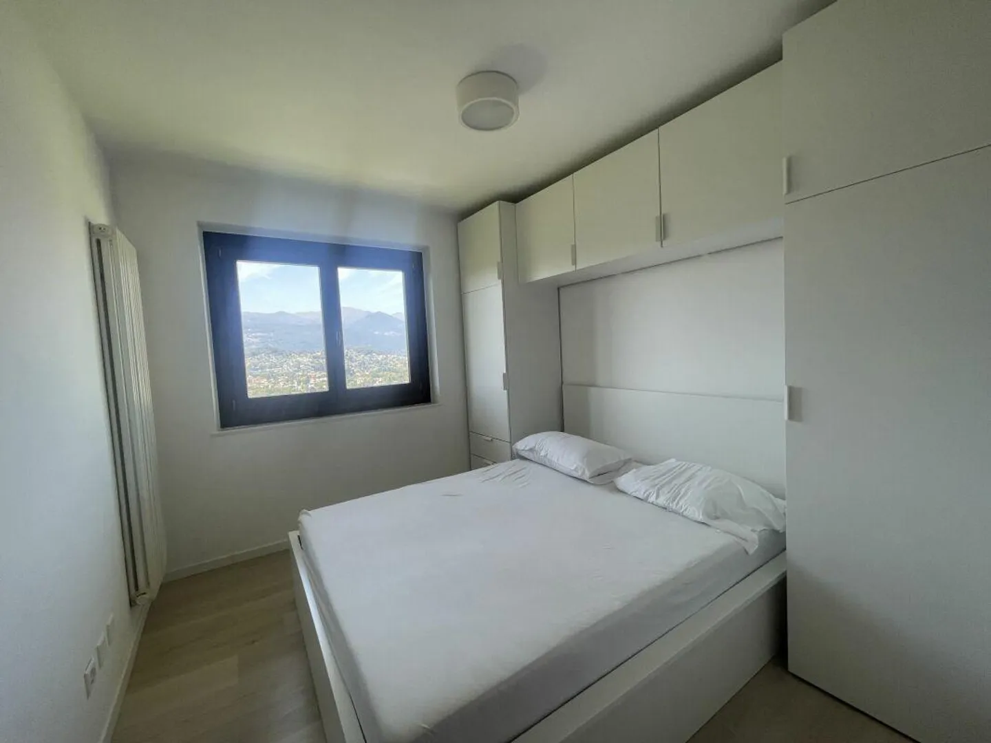 Due case unifamiliari con 3 appartamenti in vendita a Pazzallo. - Foto 6 di 8