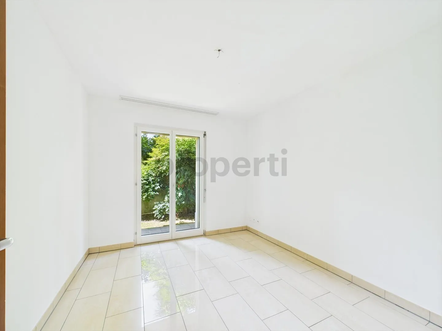 Helles 4,5-Zimmer-Apartment mit Garten in Morcote - Foto 8 von 13