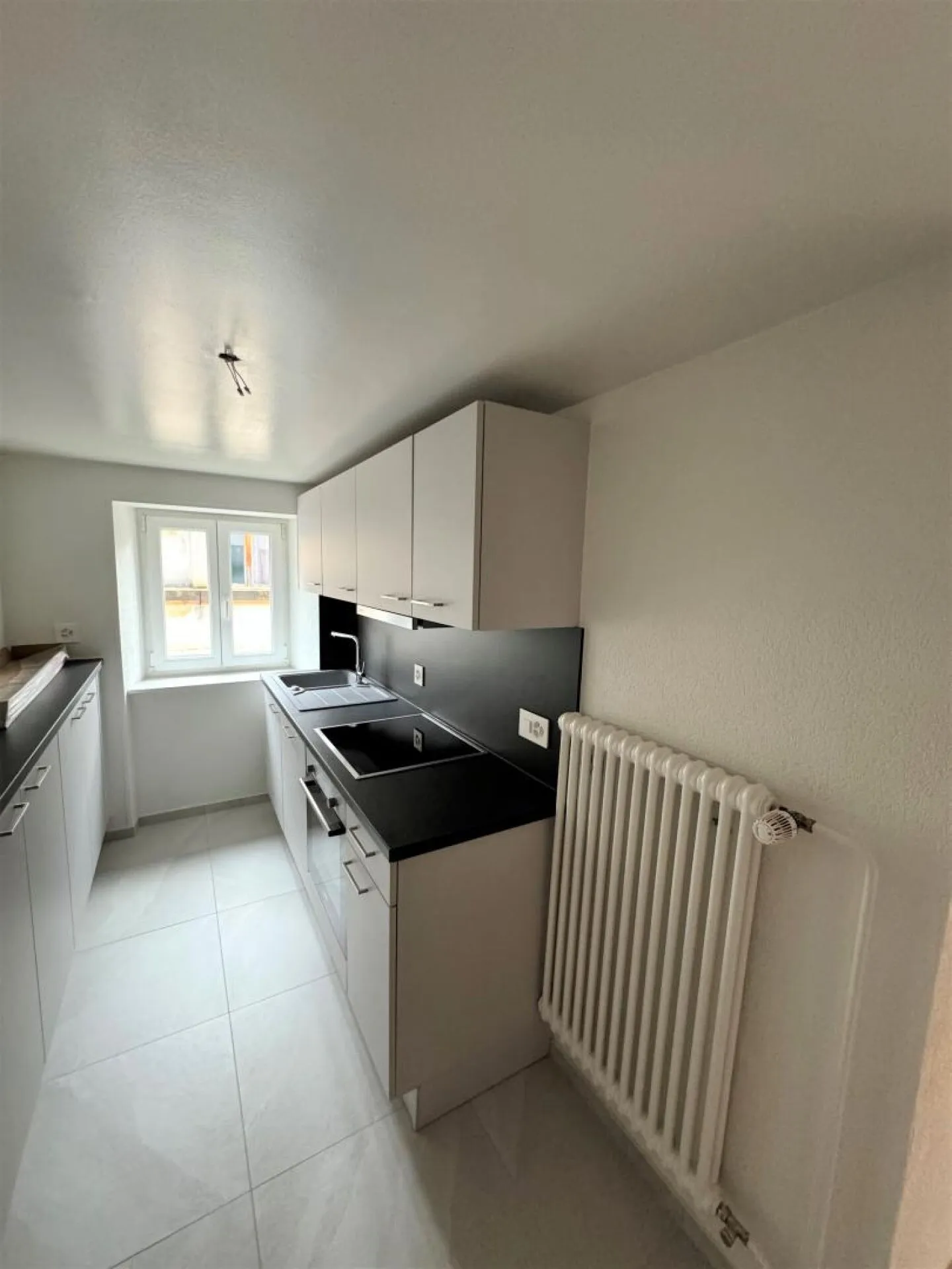 Appartement 4 pièces rénové au Locle - Photo 1 sur 5