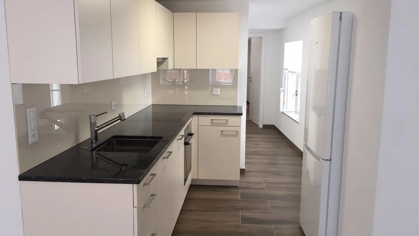 Modernisiertes 4-Parteien-MFH – vollvermietet & effizient - Foto 4 von 8