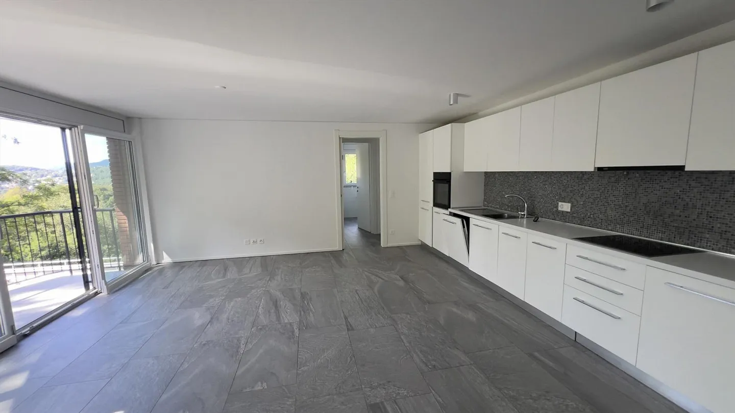 Modern 3.5-room apartment with garage in Cadro - Photo 1 of 9