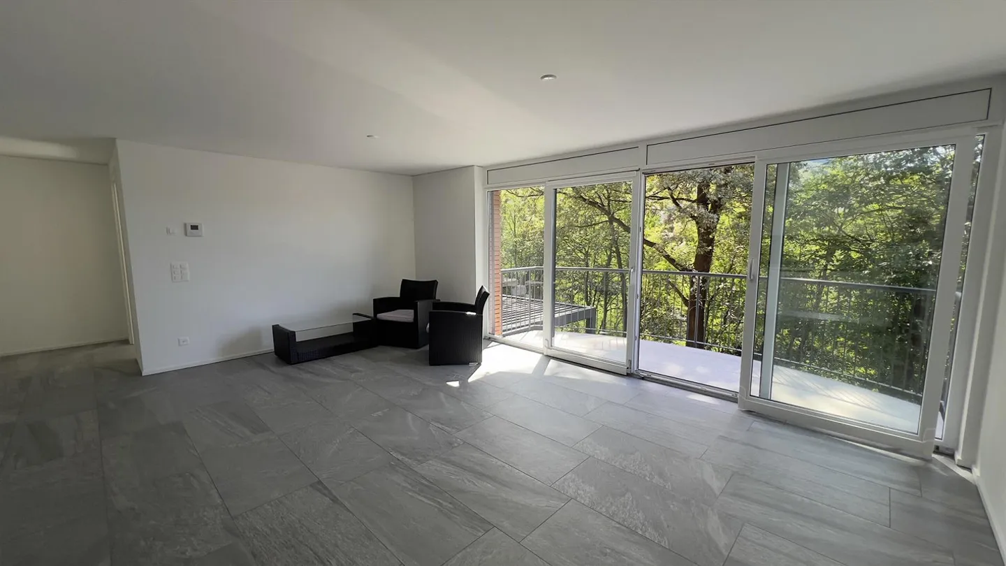 Modern 3.5-room apartment with garage in Cadro - Photo 2 of 9