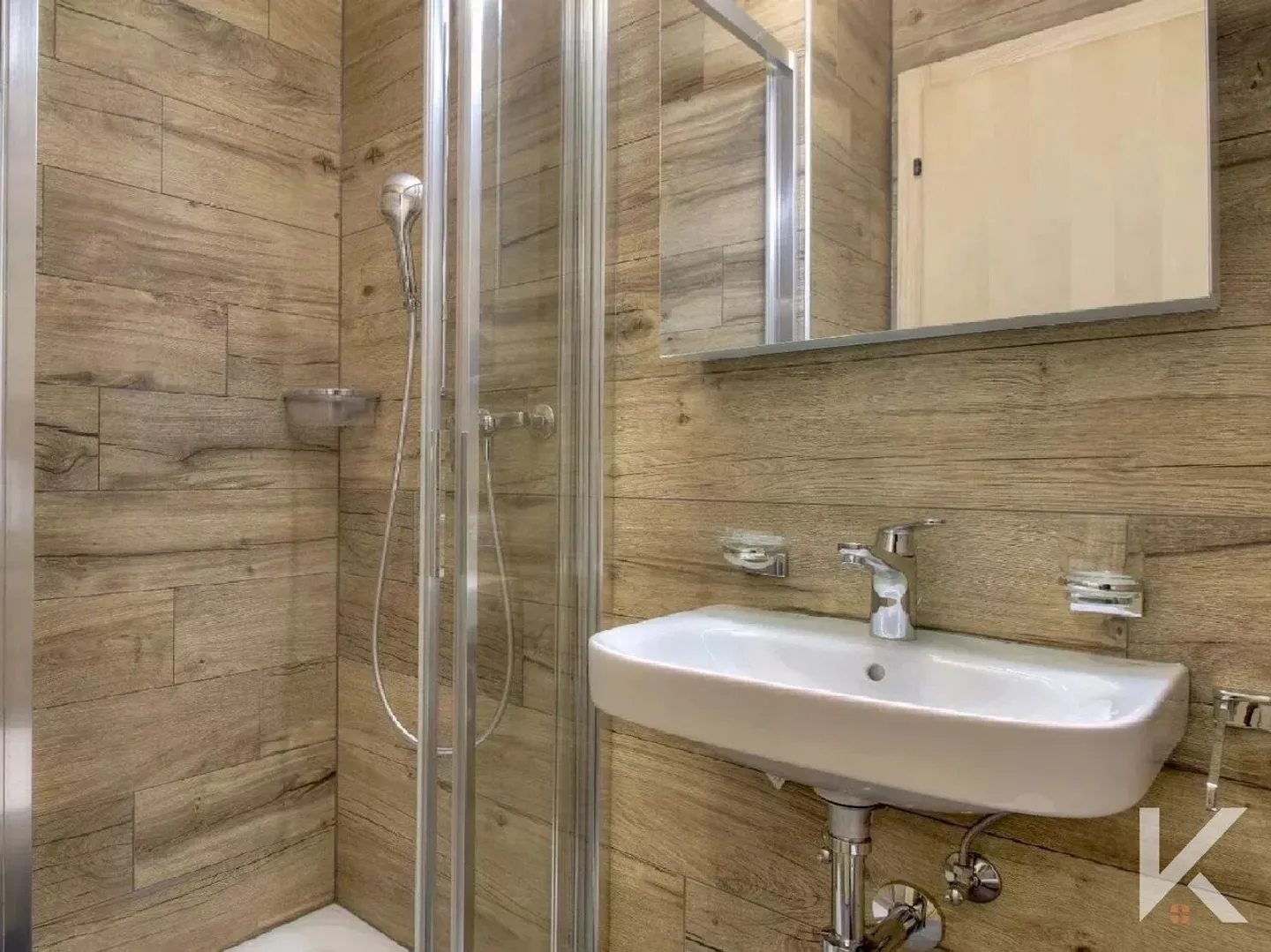 Charmant Appartement en Rez-de-Jardin - Photo 7 sur 11
