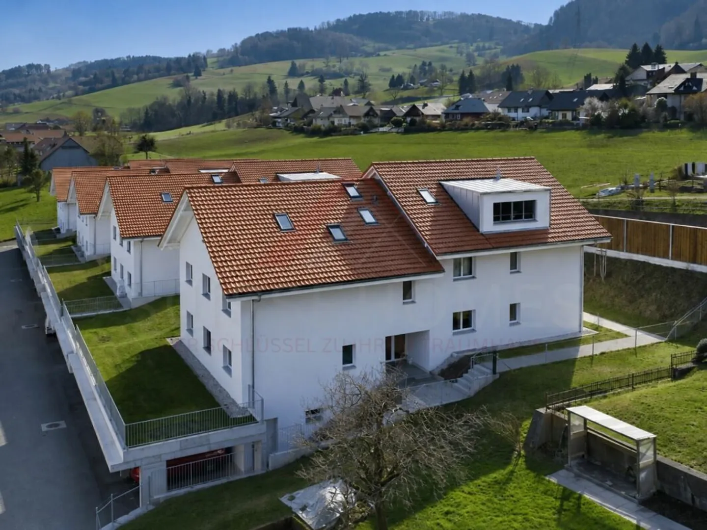 Maison multifamiliale moderne, bien entretenue et entièrement louée à Mühlethurnen - Photo 10 sur 11