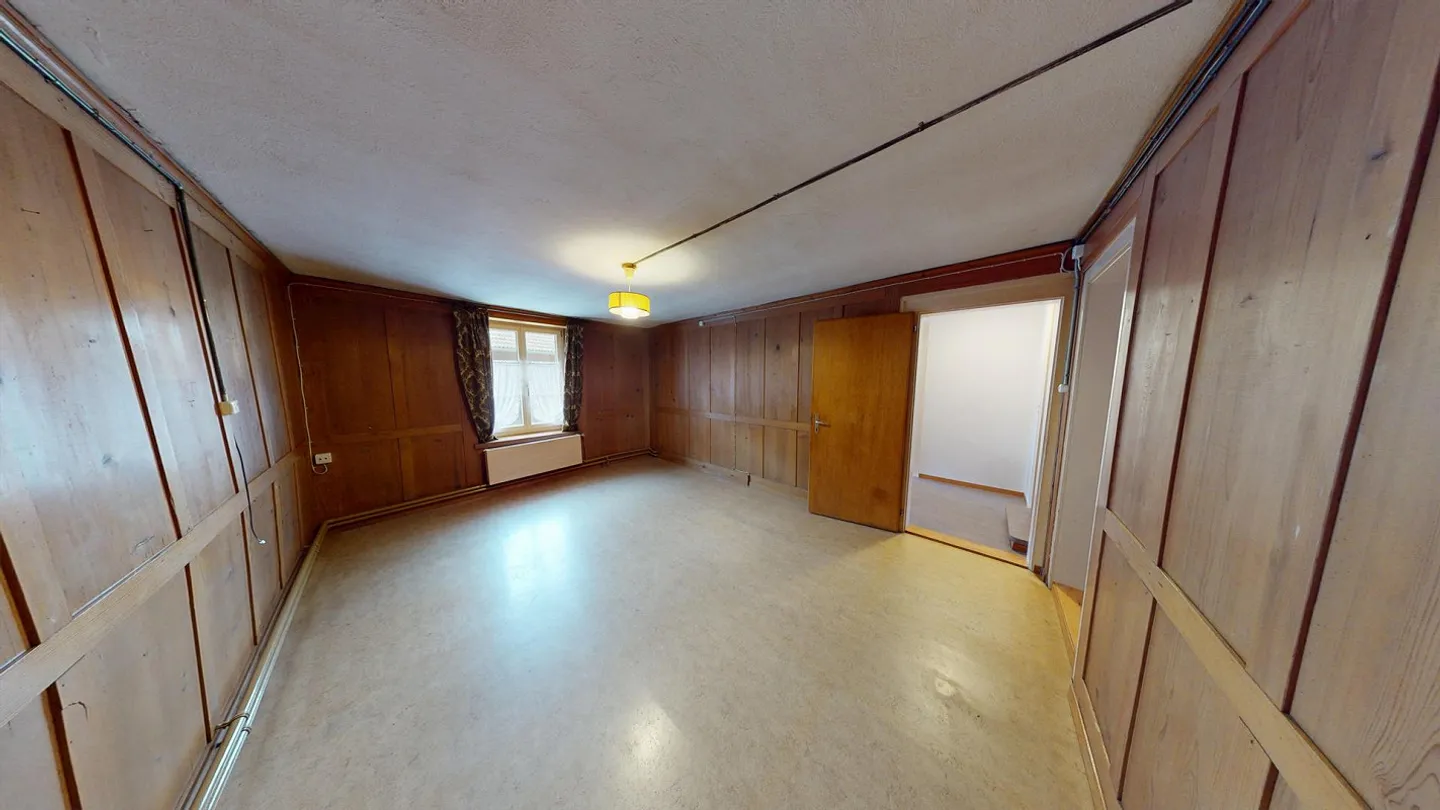 Farmhouse with two barns and outbuildings in the village center - Photo 9 of 16