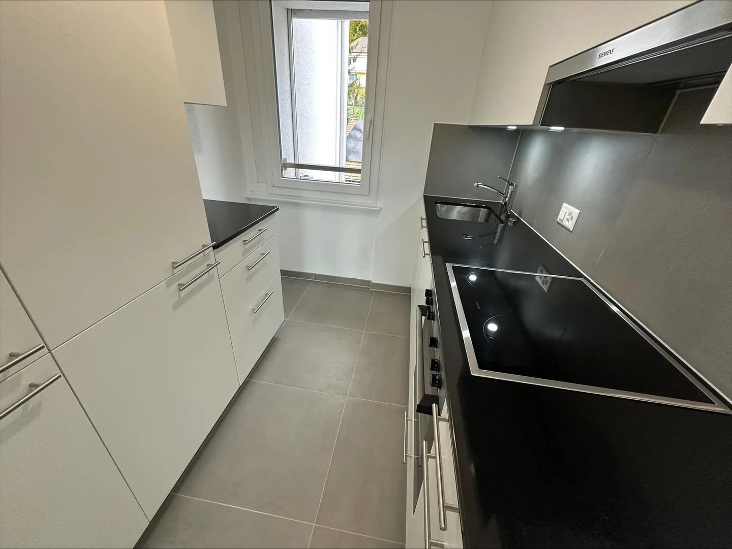 Logement de 3.0 pièces entièrement rénové idéalement situé à Neuchâtel - Photo 4 sur 11