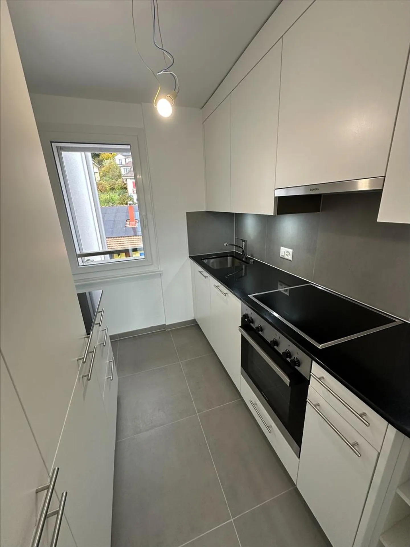 Logement de 3.0 pièces entièrement rénové idéalement situé à Neuchâtel - Photo 5 sur 11