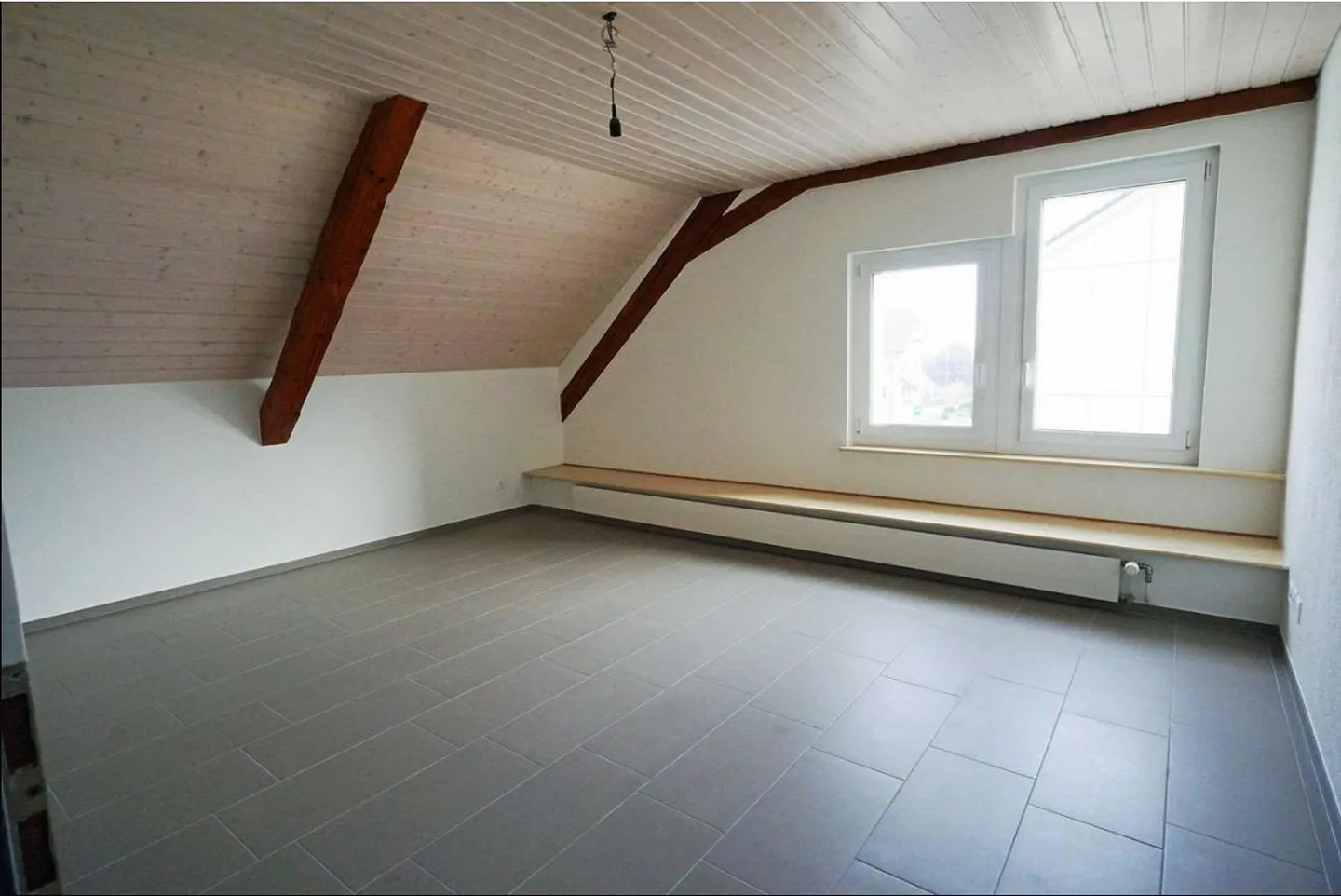 Charmante 3.5-Zimmer-Dachwohnung in Hägendorf - Foto 4 von 9