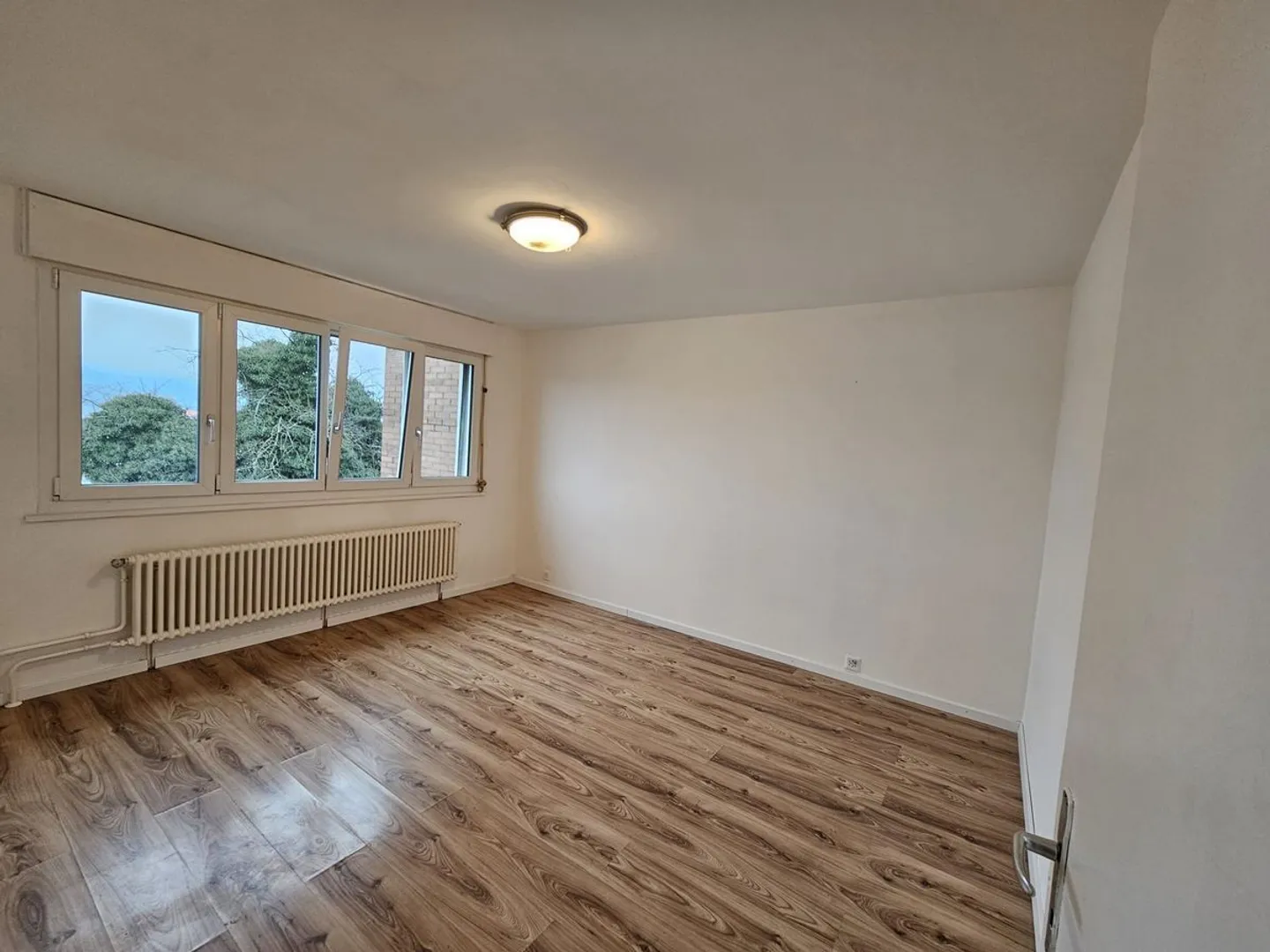 Charmant appartement 3.5 pièces - Photo 7 sur 11