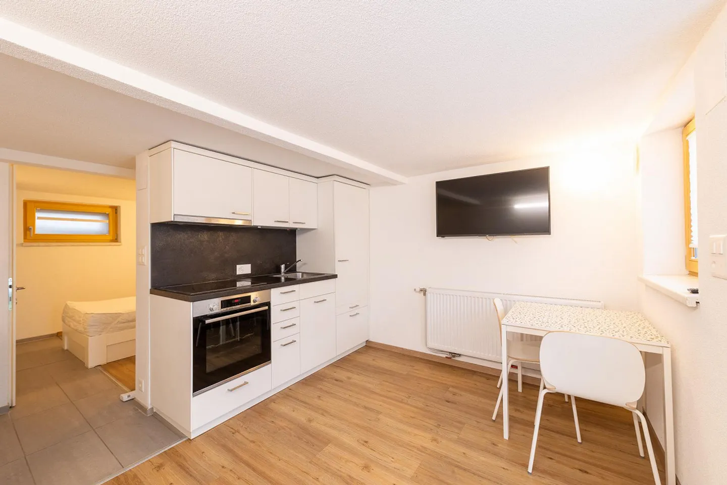 Furnished 1-room apartment with small, cozy seating area - Photo 1 of 11