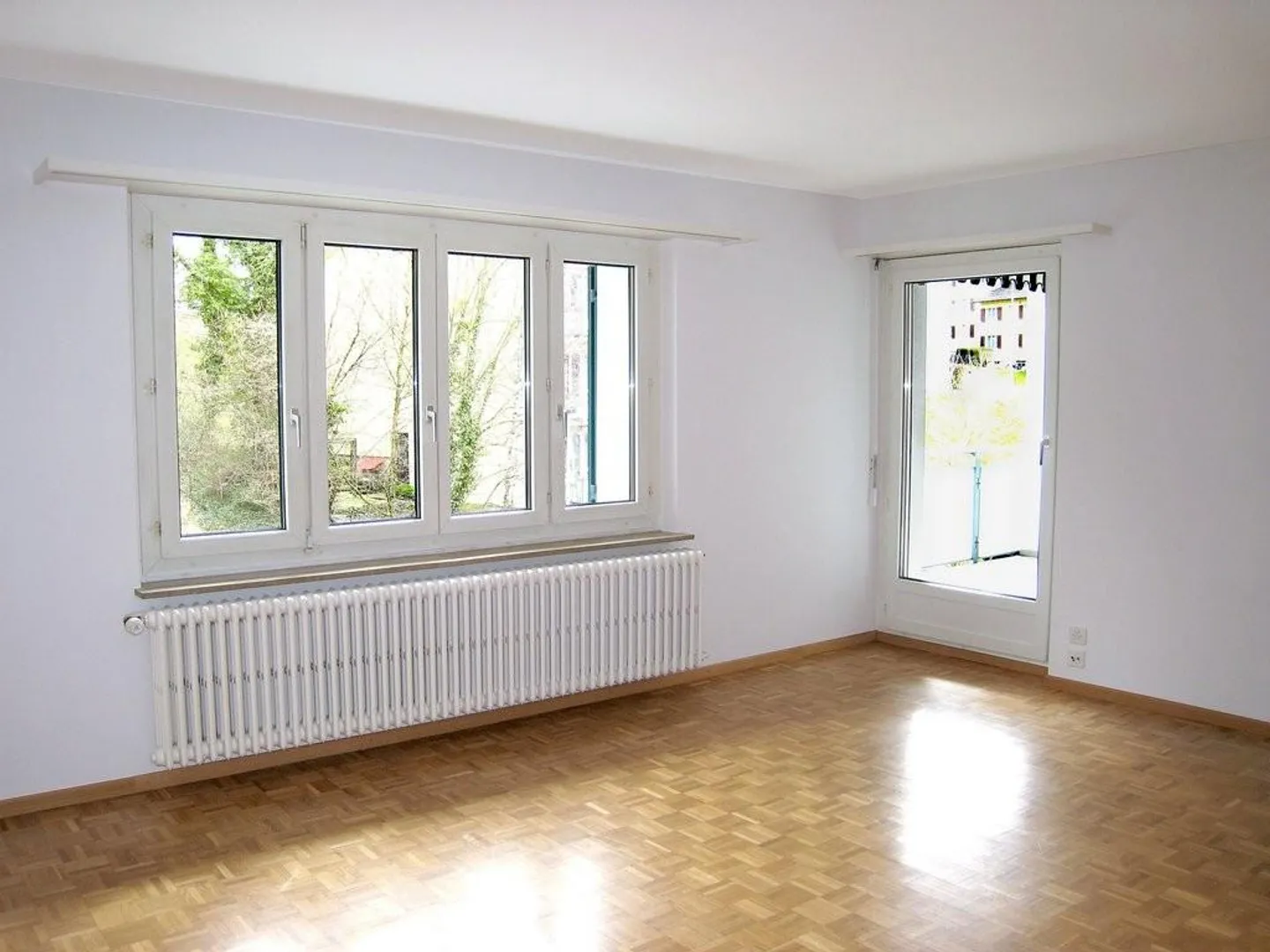 Appartement spacieux de 3,5 pièces dans une propriété bien entretenue à louer - Photo 4 sur 8