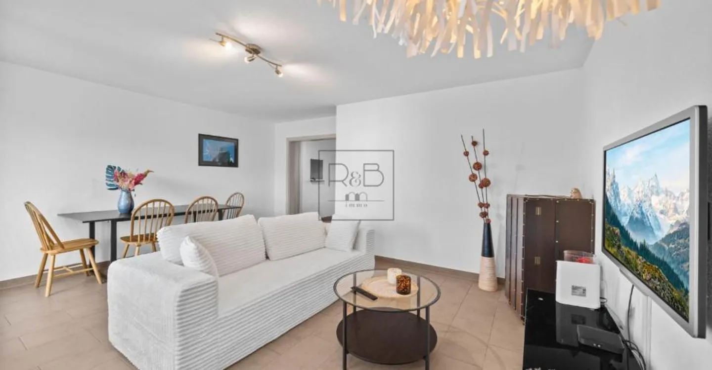 Appartement familial de 5.5 pièces au coeur de la ville - Photo 2 sur 8