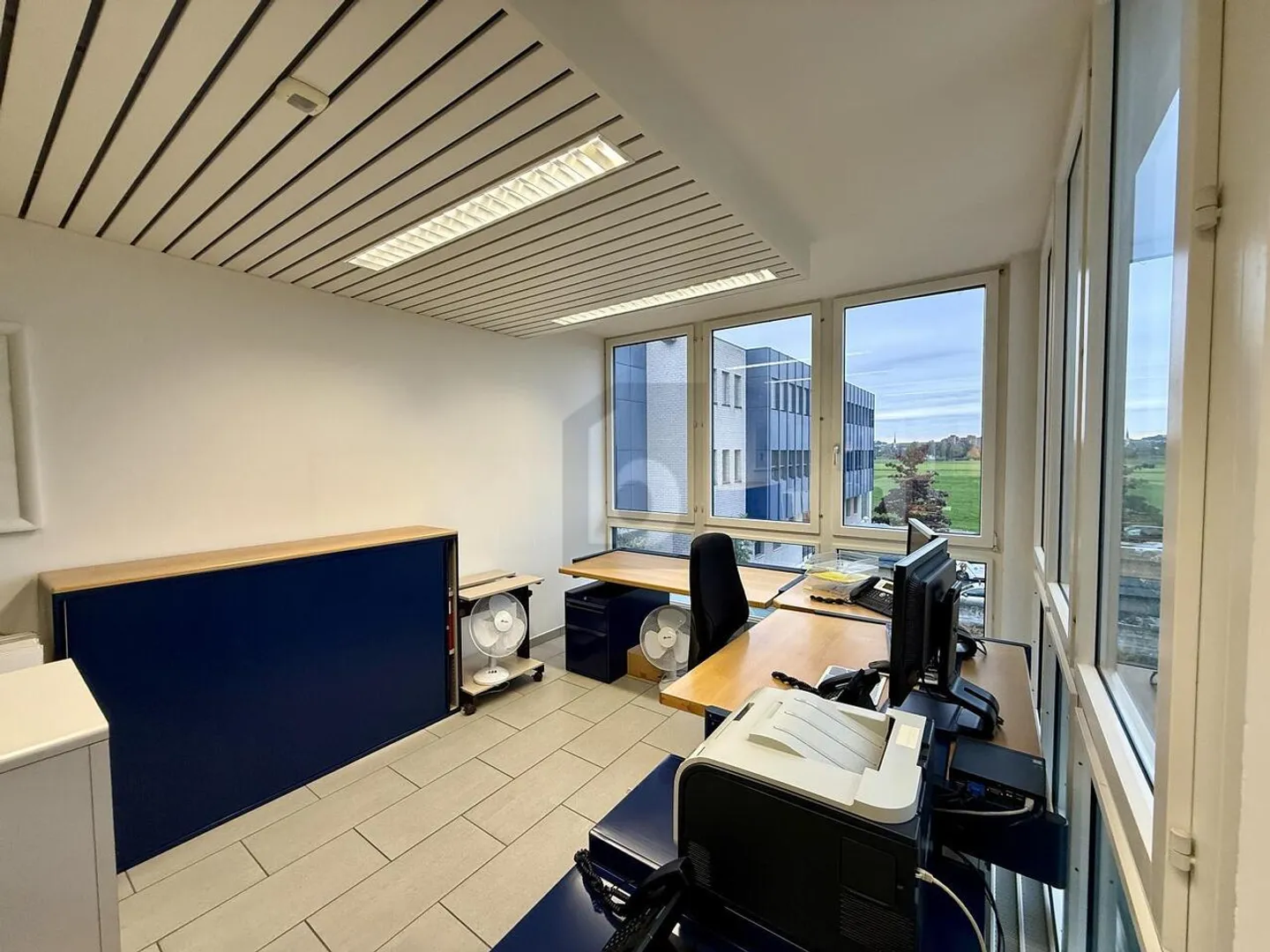 LIGHT-FLOODED WITH GENEROUS SPACE OFFER - Photo 3 of 6