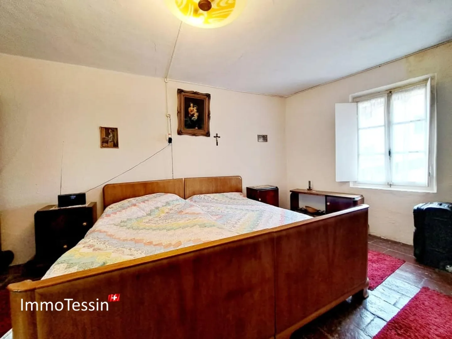 Affascinante casa di villaggio ticinese con ampio cortile interno e terrazza a un prezzo eccezionale in una posizione ambita - Foto 11 di 13