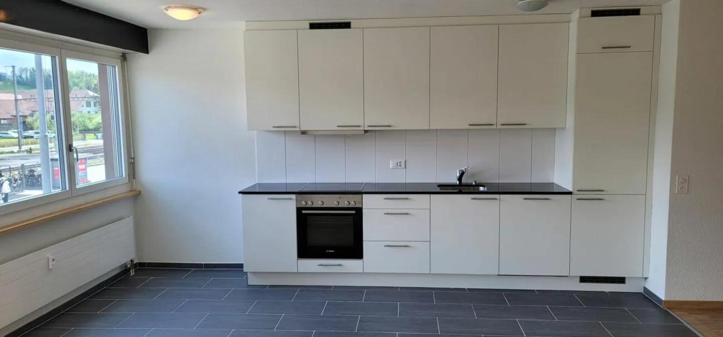 Un logement spacieux et moderne à proximité immédiate de la gare ! - Photo 4 sur 7