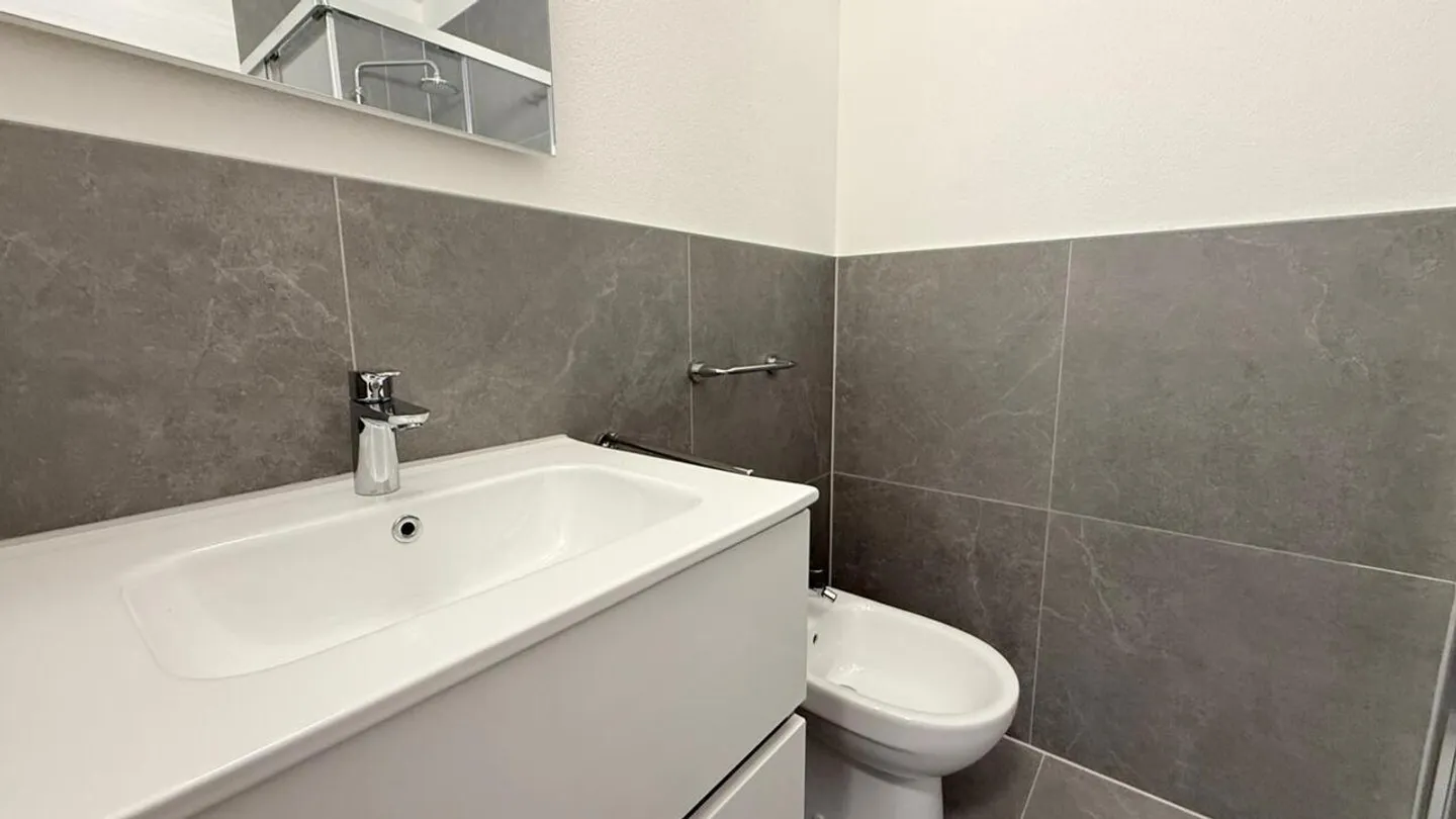 Moderne 1,5-Zimmer-Wohnung in Coldrerio - Foto 2 von 6