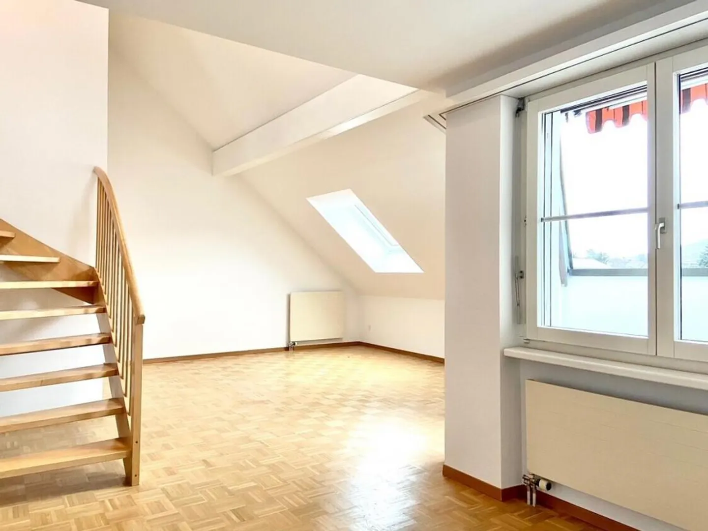 Gemütliche Dachwohnung mit Galerie - Foto 2 von 8