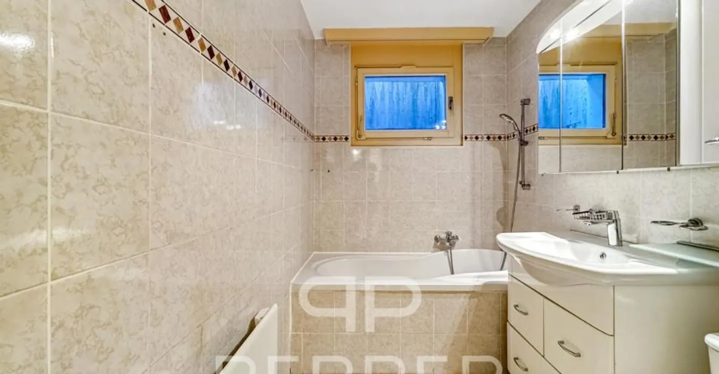 Vaste appartement en rez-de-jardin au coeur de Chailly - Foto 7 von 12