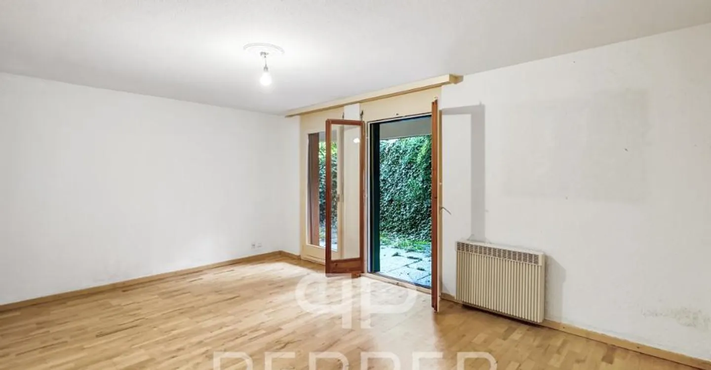 Vaste appartement en rez-de-jardin au coeur de Chailly - Foto 8 von 12