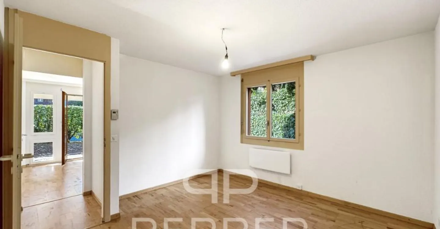 Vaste appartement en rez-de-jardin au coeur de Chailly - Foto 9 von 12